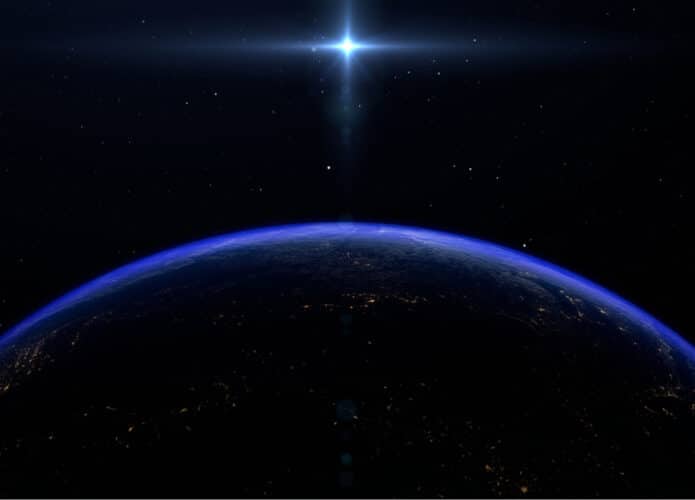 Terra vista no espaço, com um facho de luz da estrela Sirius
