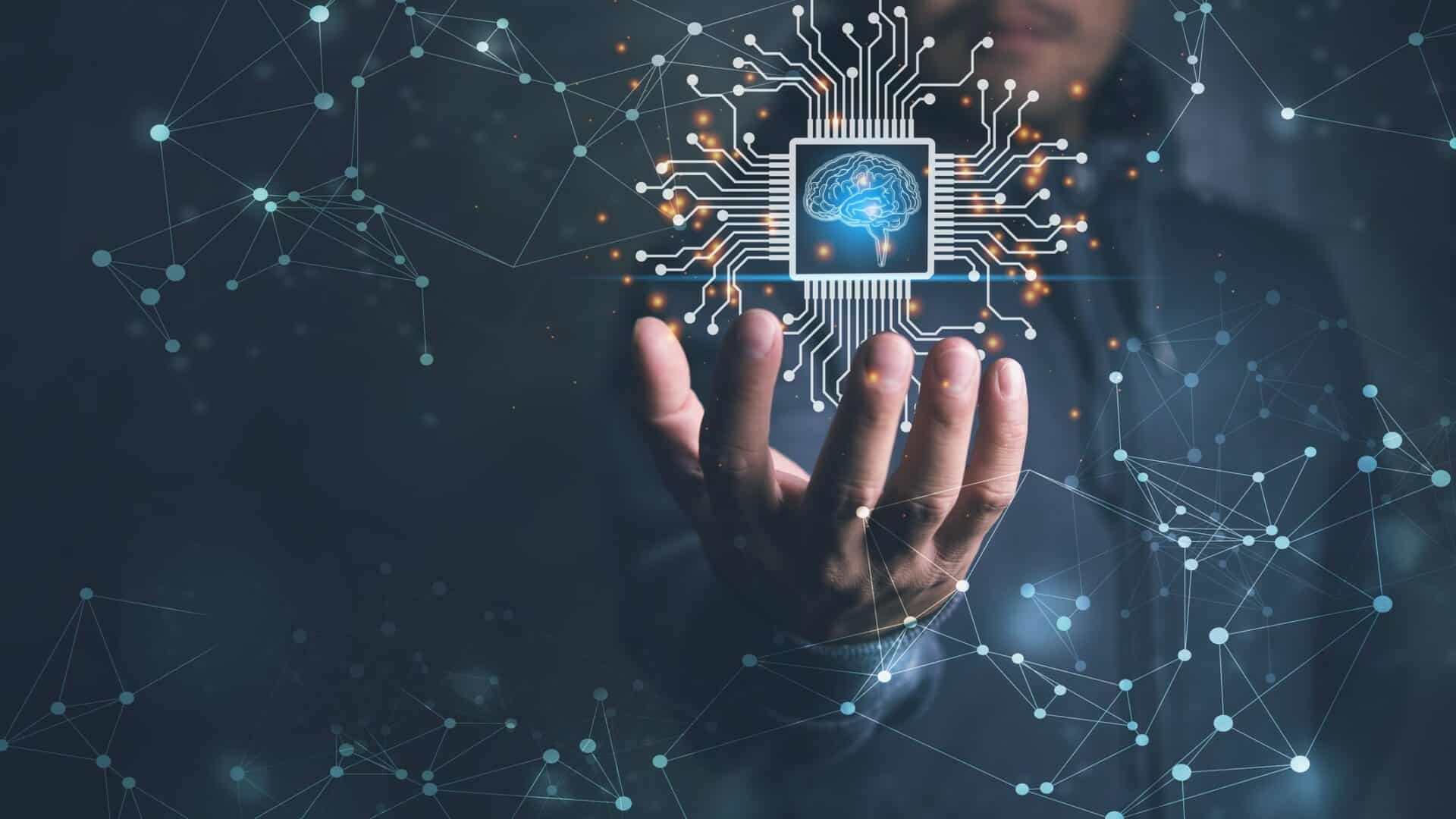 Mão humana em destaque, cercada por itens tecnológicos virtuais