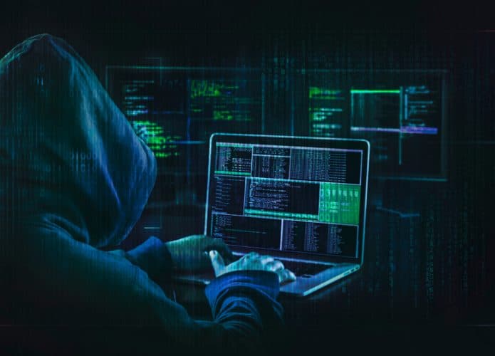 dark web hooded hacker cyber war concept