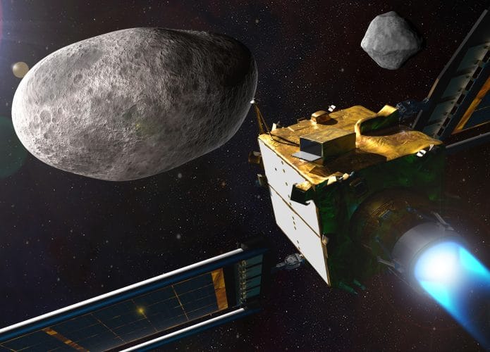 Ilustração mostra a espaçonave Dart a caminho do asteroide Didymos