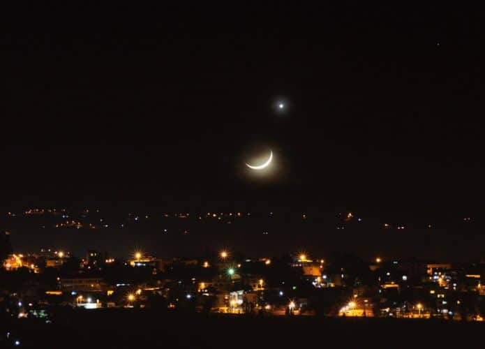 Lua e Jupiter no céu de Quito, no Equador