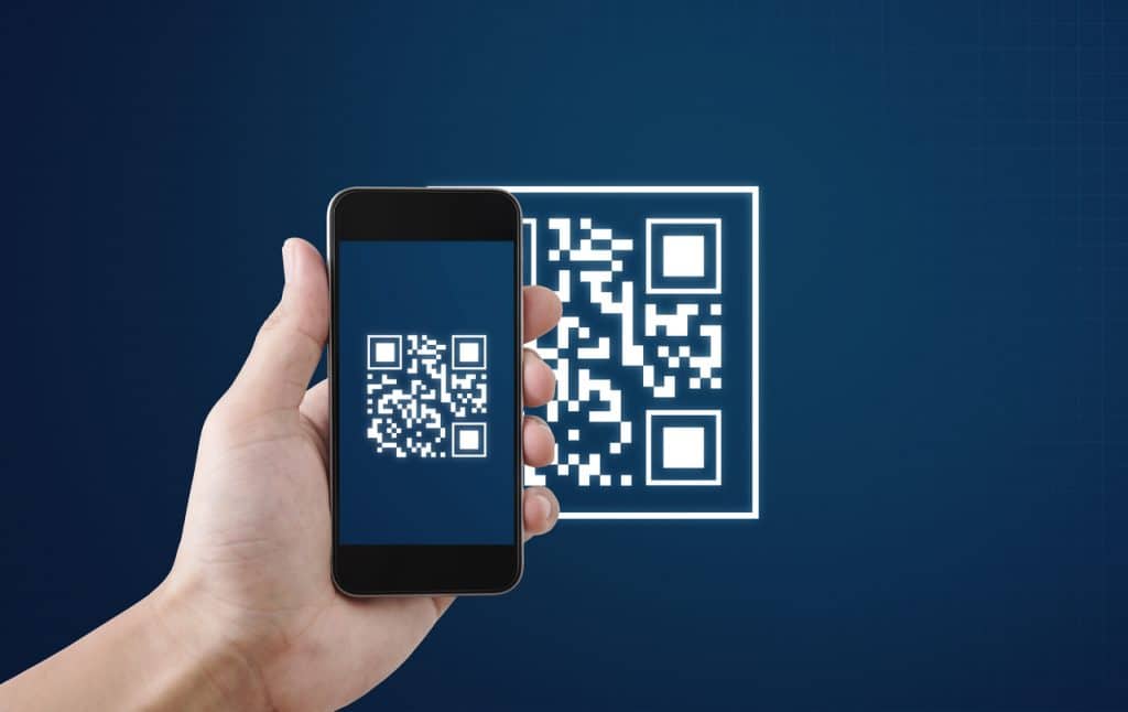 Ilustração de QR Code lido por um smartphone