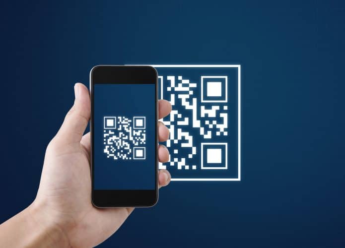 Ilustração de QR Code lido por um smartphone