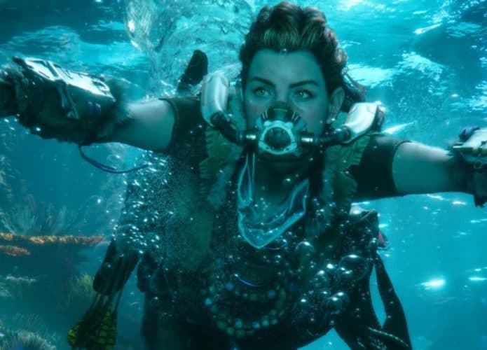 Aloy, protagonista do jogo, explora ambiente subaquático com respirador.