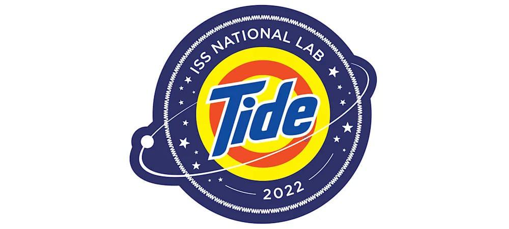 Logo do teste do sabão Tide no espaço