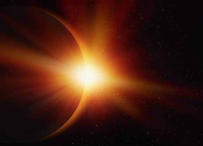 Imagem mostra um eclipse solar, detalhando o disparo de raios cósmicos pelo espaço