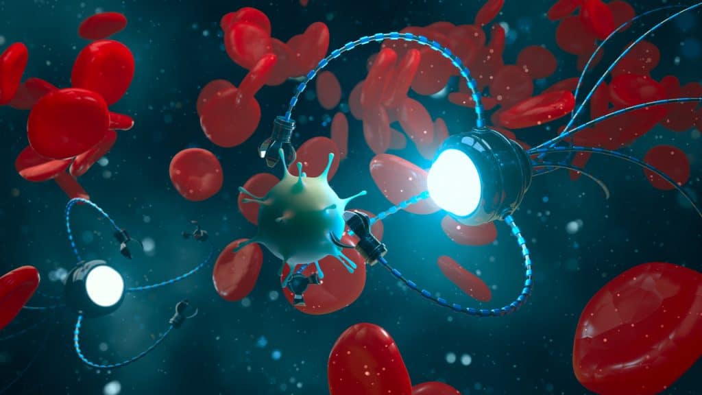 Imagem conceitual mostra um nanorobô combatendo um vírus dentro da corrente sanguínea