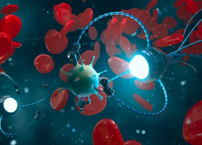 Imagem conceitual mostra um nanorobô combatendo um vírus dentro da corrente sanguínea