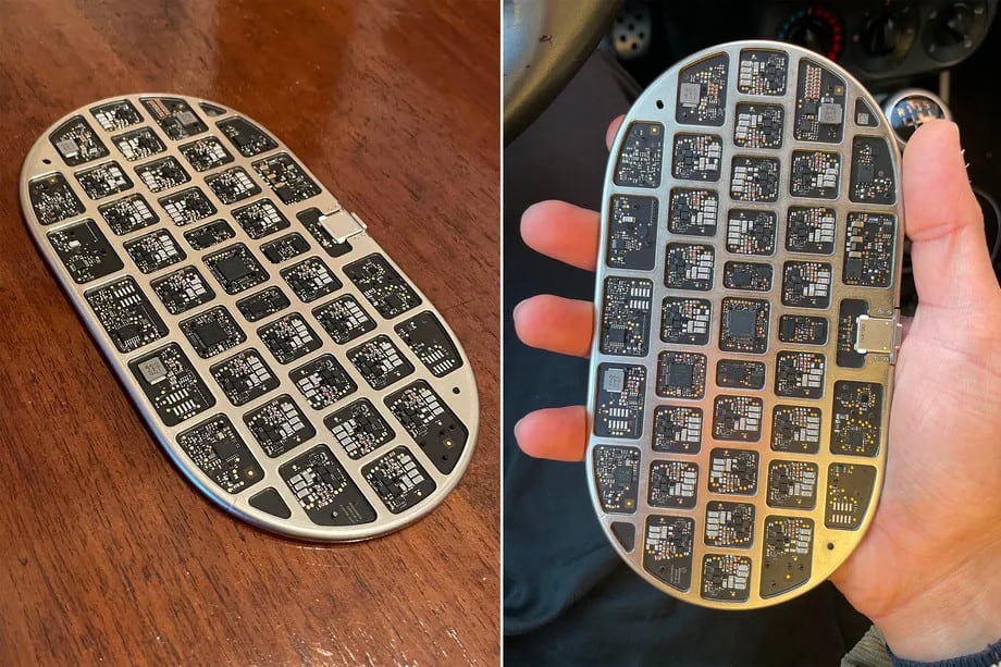Protótipo de um carregador AirPower. Estrutura interna em alumínio lembra um teclado, e cada "quadradinho" é um controlador de carga. Imagem: Giulio Zompetti.