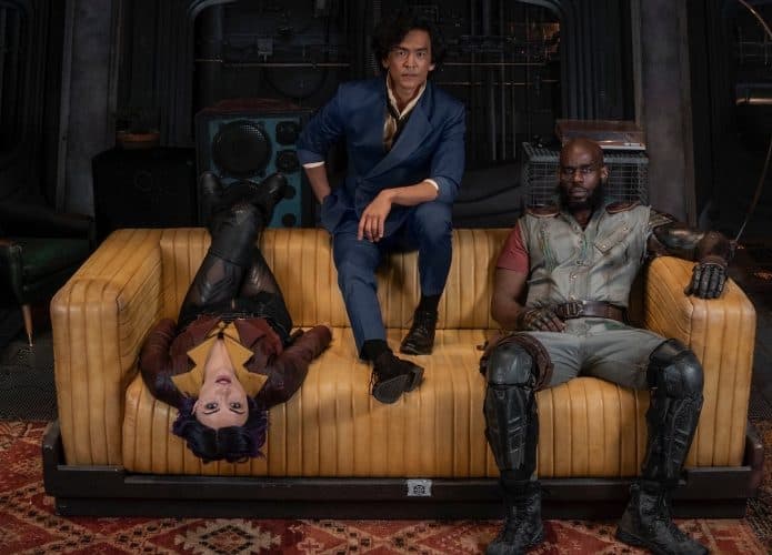 COWBOY BEPOP (L to R) DANIELLA PINEDA as FAYE VALENTINE, JOHN CHO as SPIKE SPIEGEL and MUSTAFA SHAKIR as JET BLACK on the set of COWBOY BEPOP Cr. NICOLA DOVE/NETFLIX © 2021