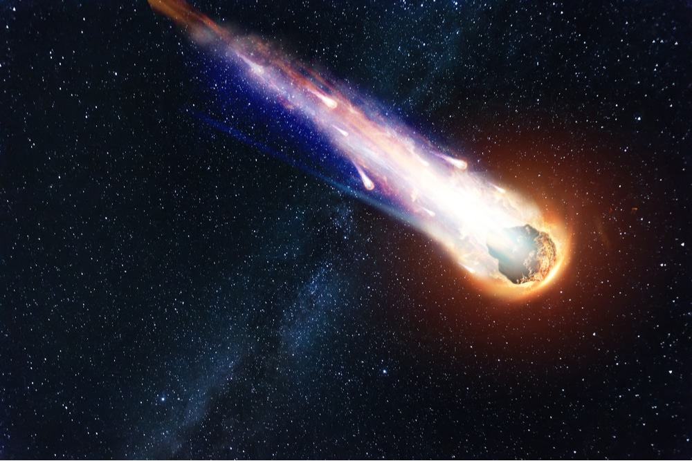 Imagem de um asteroide queimando no espaço. Pesquisador americano quer encontrar mais asteroides ativos, que são asteroides que se comportam como um cometa