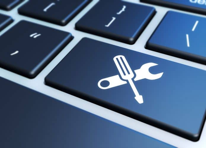 Ícone de ferramenta em um teclado de laptop