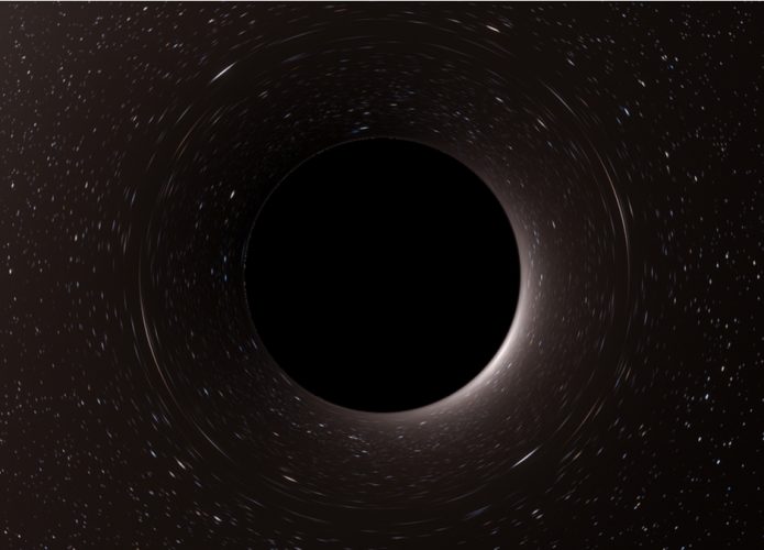 Ilustração que mostra um buraco negro consumindo um feixe de luz