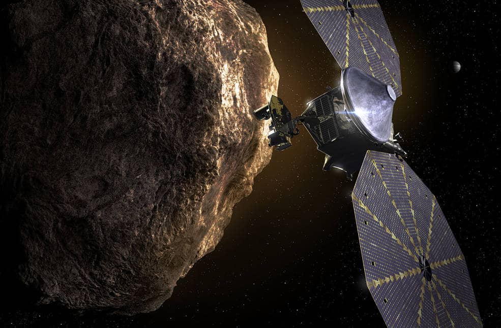 Ilustração da sonda Lucy próxima a um asteroide. Imagem: Nasa