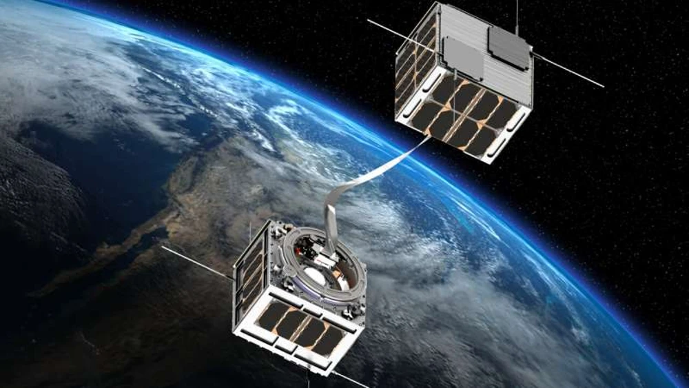 Ilustração de universidade espanhola mostrando o uso de um cabo eletrodinâmico para movimentar dois satélites