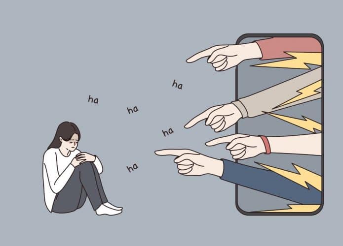 Ilustração de uma mulher sendo apontada por diversas mãos que saem de um celular