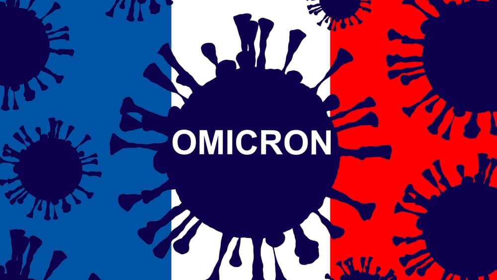 Bandeira da França ao fundo de desenhos do coronavírus