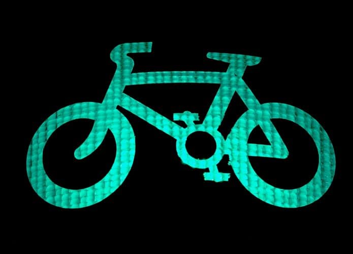 Ilustração de uma bicicleta verde para remeter à lei de transporte de bens serviços por bicicletas e triciclos