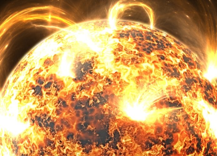 Proeminências Solares em forma de arco na superfície do Sol