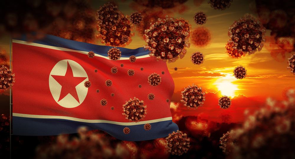 Ilustração da bandeira da Coreia do Norte com o SARS-CoV-2