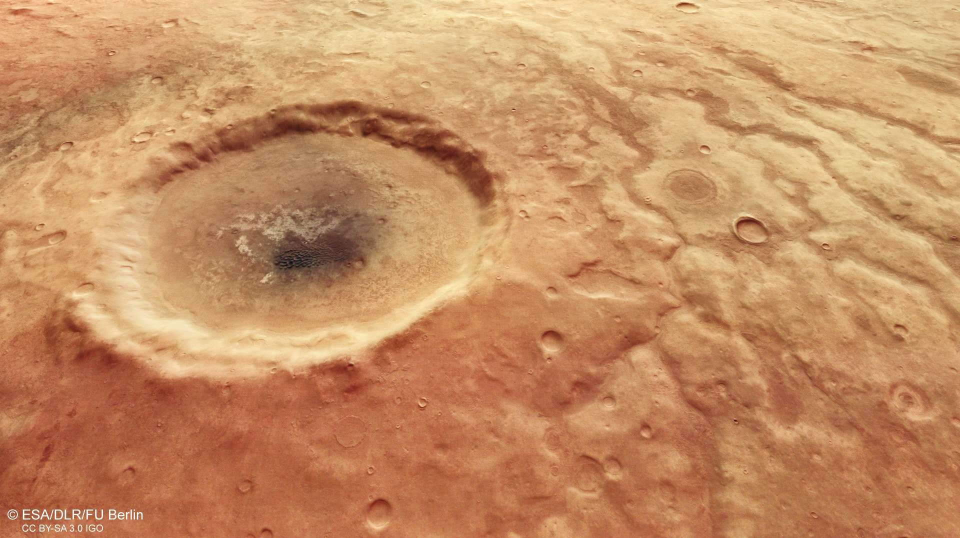Perspective_view_of_crater_in_Aonia_Terra