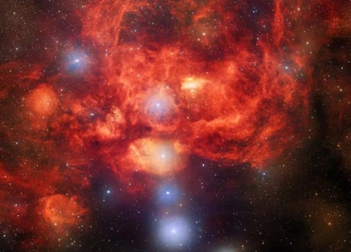 nebulosa-da-lagosta-brilhando-em-vermelho-695x500