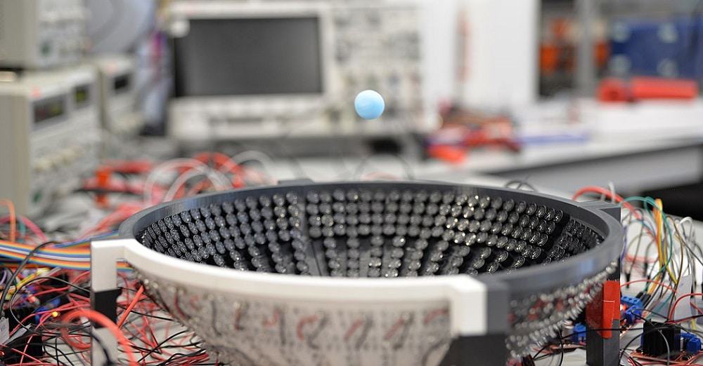 1079px-Acoustic_Virtual_Vortices_Levitating_Mie_Particle