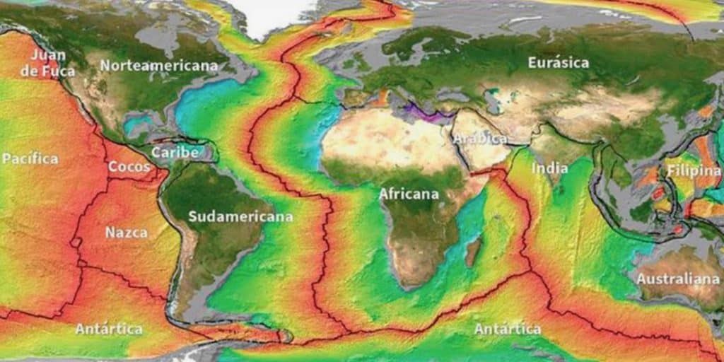 Mapa mundi com placas tectônicas e zonas sísmicas demarcadas