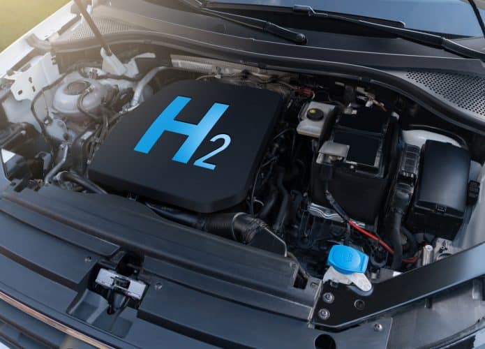 Motor de carro com o símbolo H2, forma molecular formada através da ligação covalente entre dois átomos de hidrogênio