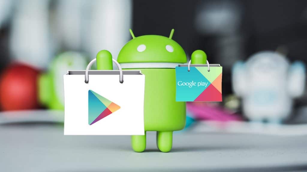 Boneco do Android carregando sacolas com logomarcas da Play Store e do Google Play