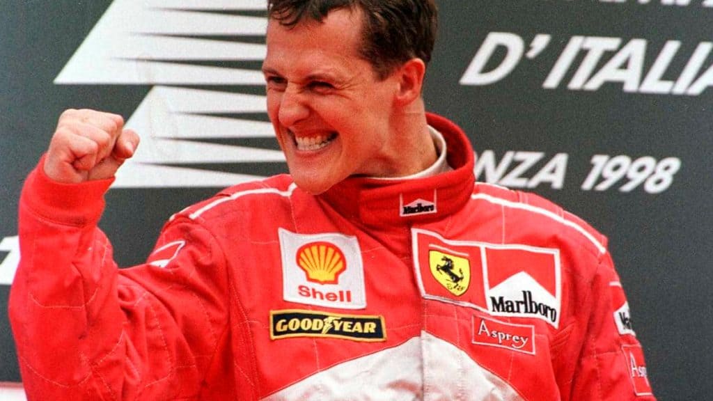 Piloto de F1 Michael Schumacher em pódio