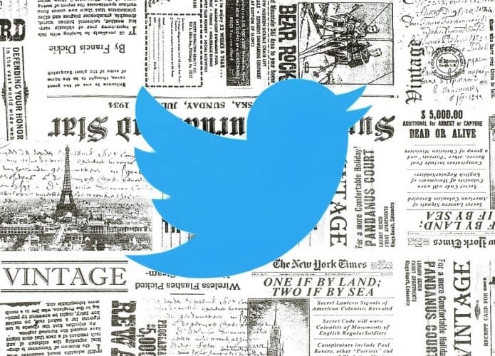 Logomarca do Twitter com recortes de jornal ao fundo