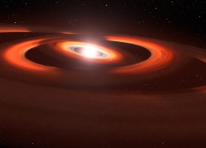 A estrela TW Hydrae possui discos protoplanetários levemente inclinados (Credito: NASA, AURA/STScI para ESA, Leah Hustak (STScI)