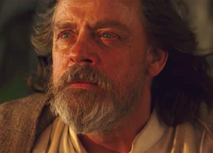 Lukę Skywalker olhando para o horizonte durante por do sol em Star Wars