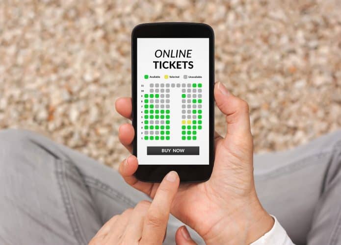 Ilustração representa a compra de ingressos online