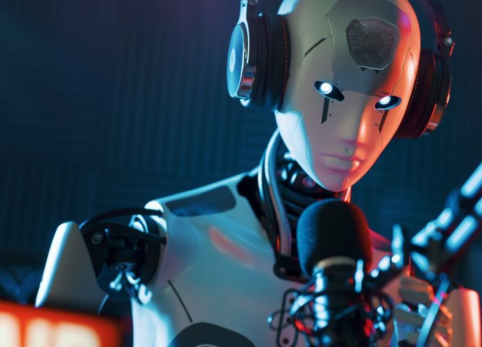 Robô humanoide em estúdio de gravação usando headphone de frente para um microfone