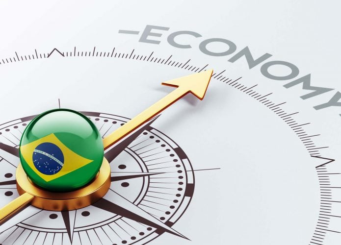 Ilustração de bússola, representando rumo da economia brasileira