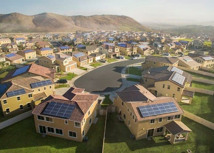 Ilustração de casas que fazem parte da usina de energia virtual da Tesla