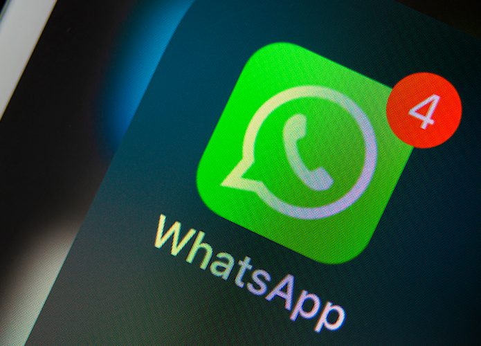 Ícone do WhatsApp com número sinalizando quatro mensagens novas num iPhone