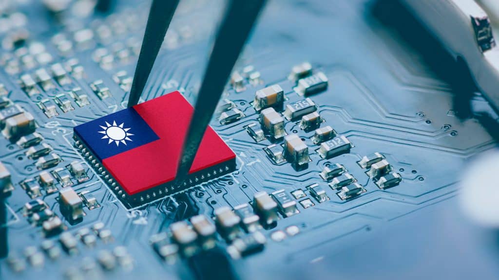 Ilustração de pinça pegando chip com bandeira de Taiwan desenhado nele