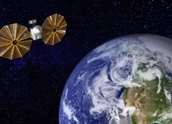 Ilustração da espaçonave Lucy durante aproximação com a Terra (Crédito: NASA/Robert Lea (criada com Canva))
