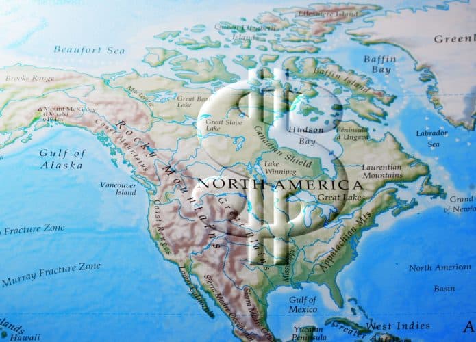 Mapa da América do Norte com um cifrão em cima