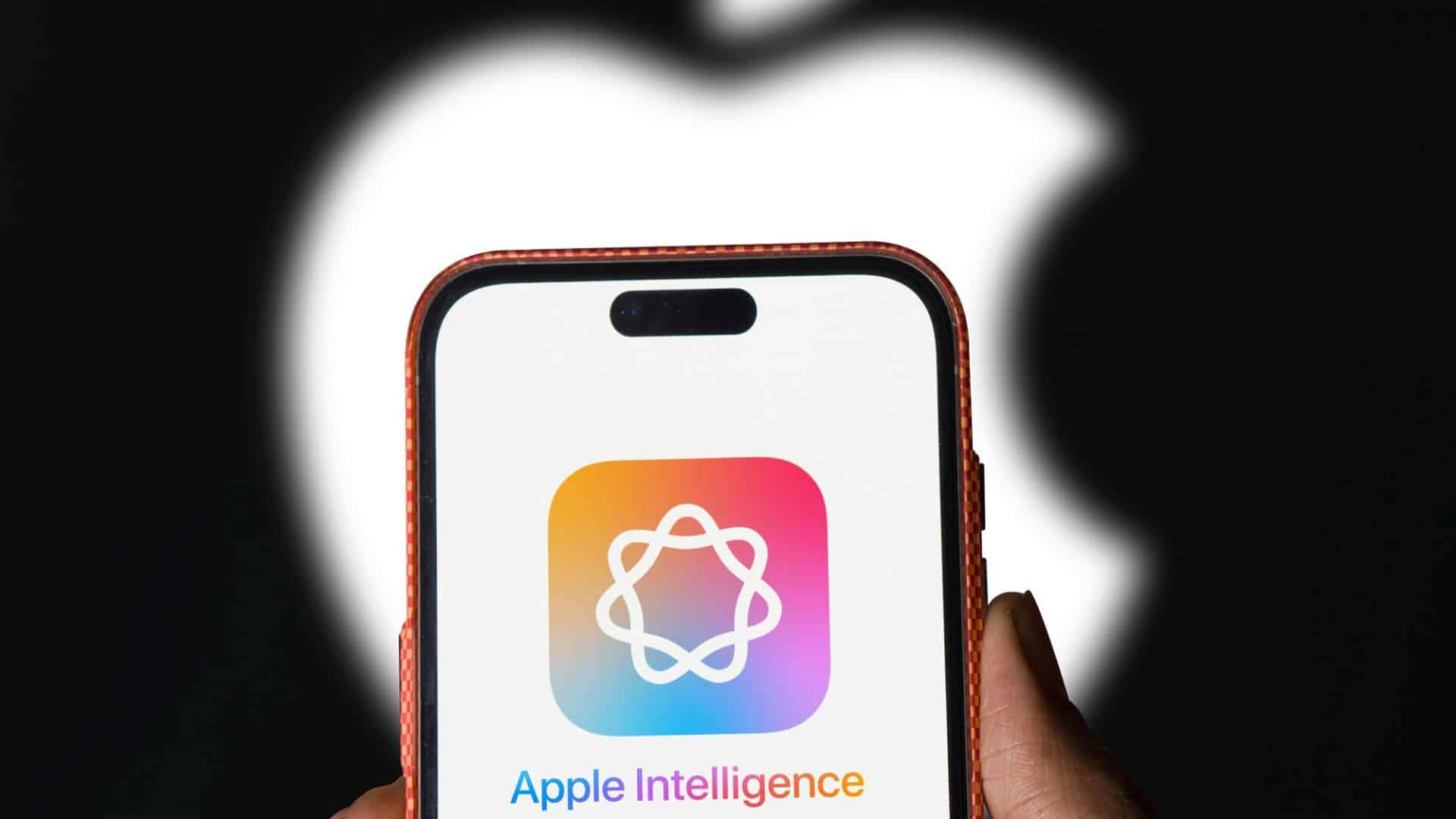 Logo do Apple Intelligence em um smartphone com o logo da Apple ao fundo