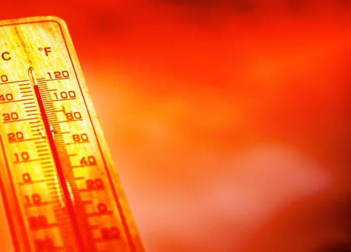 Ilustração digital com termômetro marcando temperatura alta em dia vermelho