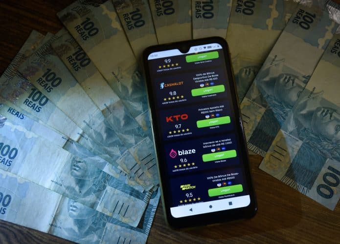 Celular com apps de apostas, apostar em bet pode ser um vícios