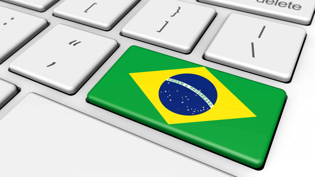 Tecla com bandeira do Brasil em teclado de notebook