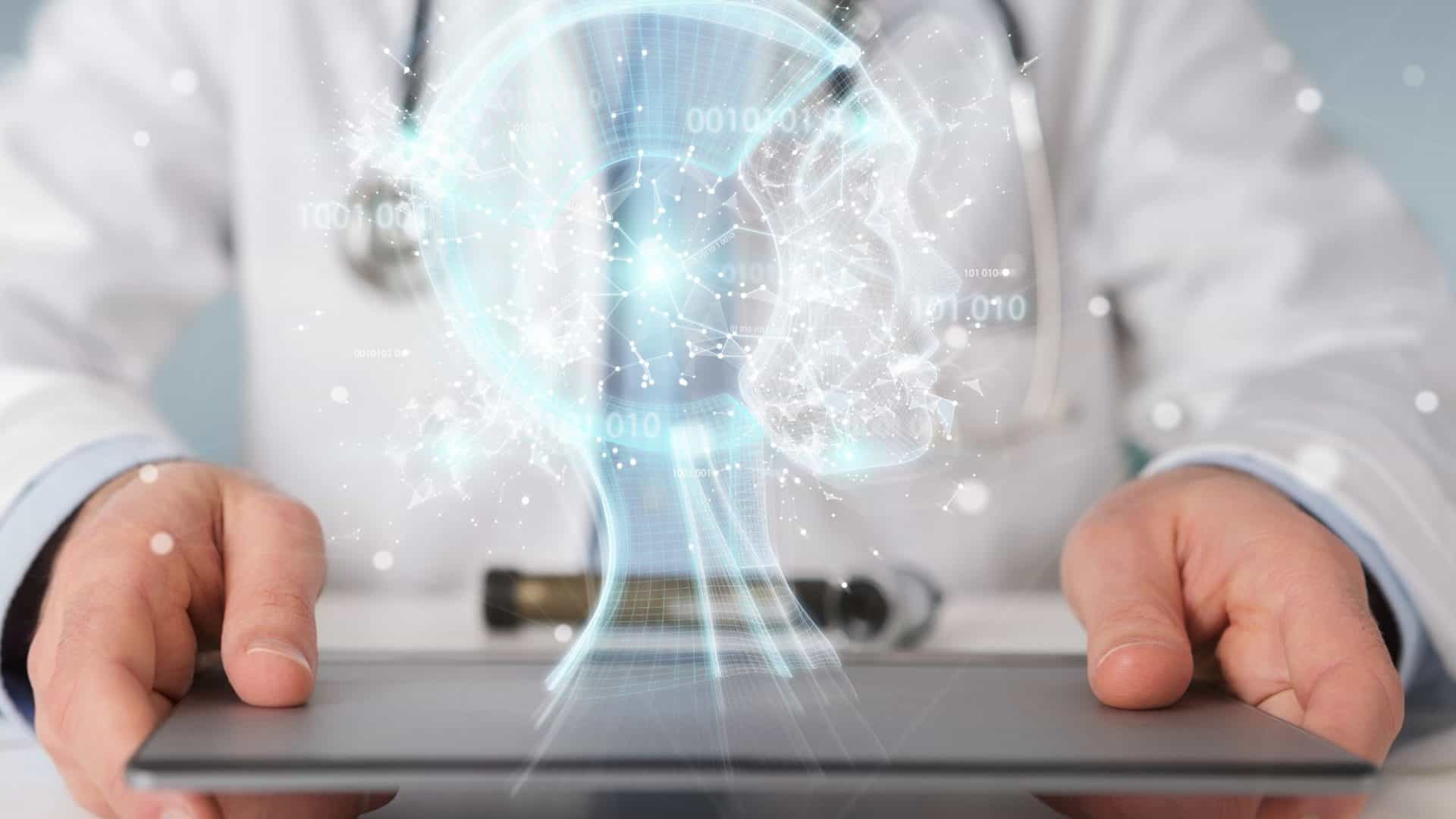 Holograma de cabeça digital saindo de um tablet segurado por uma pessoa