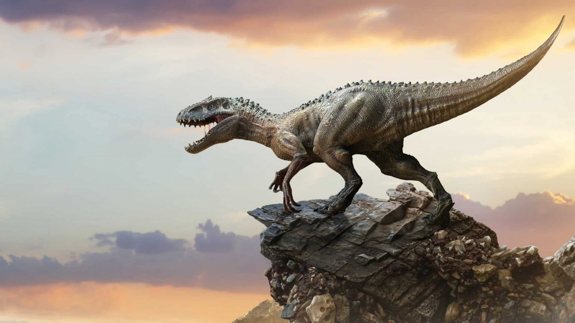 Dinossauro em cima de uma rocha com a boca aberta