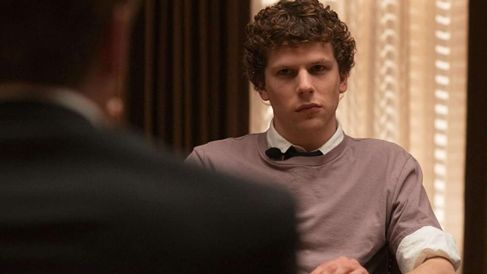 Jesse Einserberg como Mark Zuckerberg no filme A Rede Social