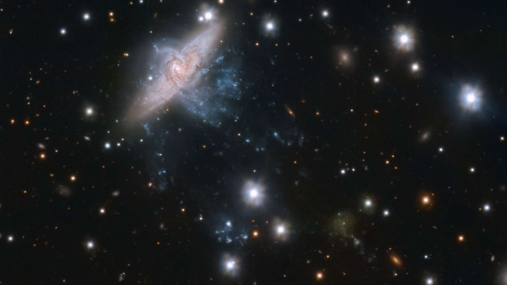 Imagem das galáxias NGC3314 e UDG32 captada pelo telescópio VST